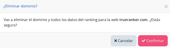 Diálogo ¿Eliminar dominio? para trueranker.com, con los botones Cancelar y Confirmar.